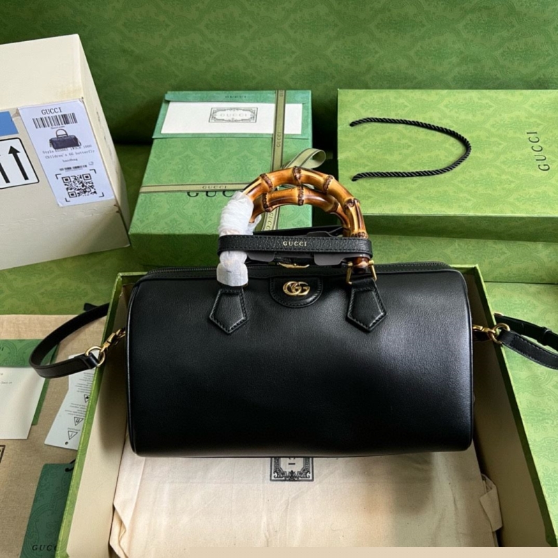 G*u*i top handle bags